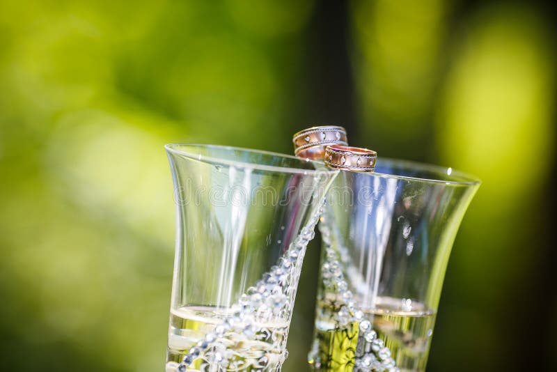 Wedding Rings Lie on Champagne Glasses Stock Image Image of symbol