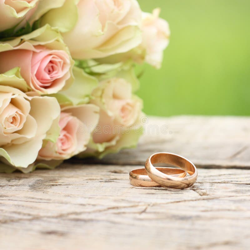 Wedding rings and roses