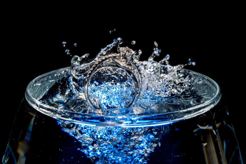 Wedding Rings Sinking in a cup of Water