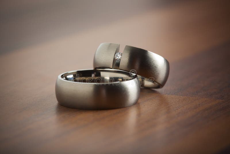 Wedding rings on the table stock photo. Image of focus 15261286