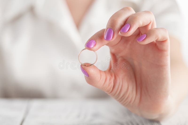 Woman Hand Holding MRI Brain Film To See for Diagnostic and Report