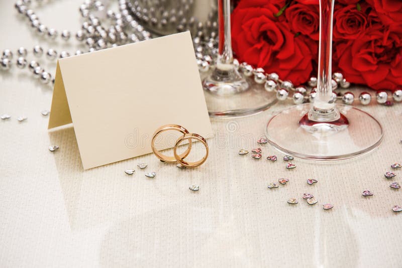 Wedding rings with writing card and champagne royalty free stock images Wedding rings with writing card and champagne royalty free stock images