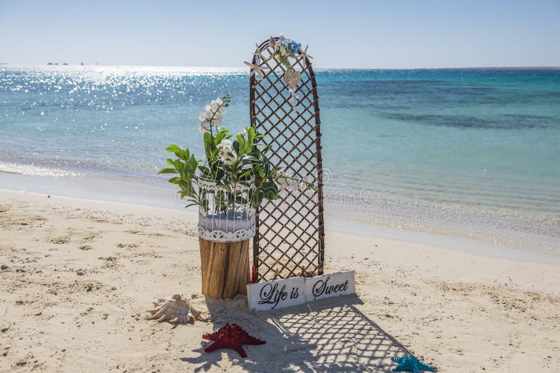 Wedding sign set up on a tropical beach paradise