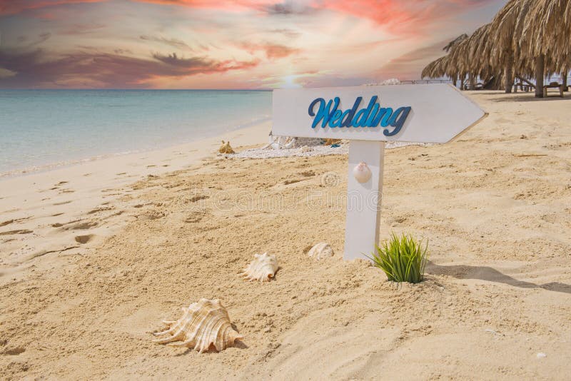 Wedding sign on a tropical beach paradise