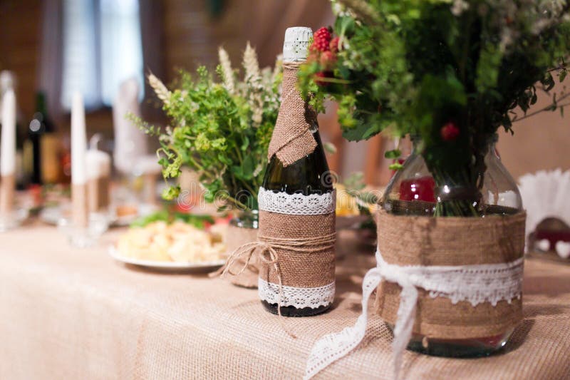 Wedding table. Bottles of champagne wine dressed in wedding gowns. Wedding cone stock images, royalty-free photos and pictures