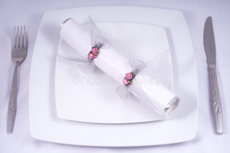 Table Place Setting with a Traditional Cracker royalty free stock image