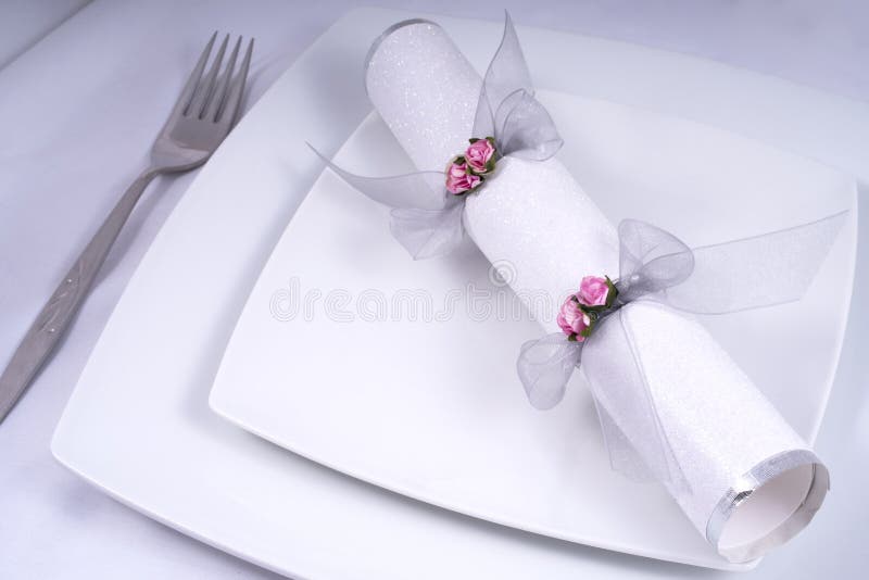 Wedding Table Place Setting with a Traditional Cracker royalty free stock photo