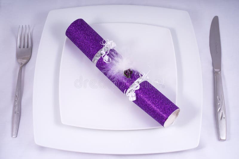 Wedding Table Place Setting with a Traditional Cracker royalty free stock photos