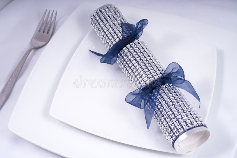 Wedding Table Place Setting with a Traditional Cracker stock image