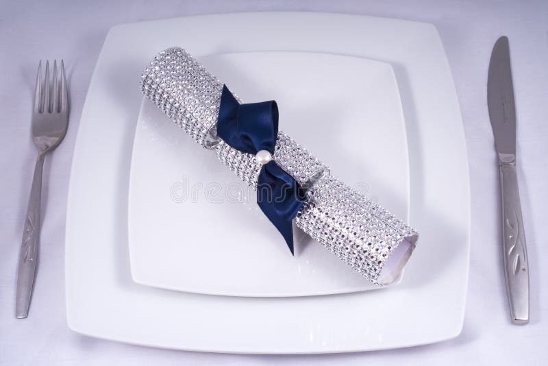 Wedding Table Place Setting with a Traditional Cracker royalty free stock photos
