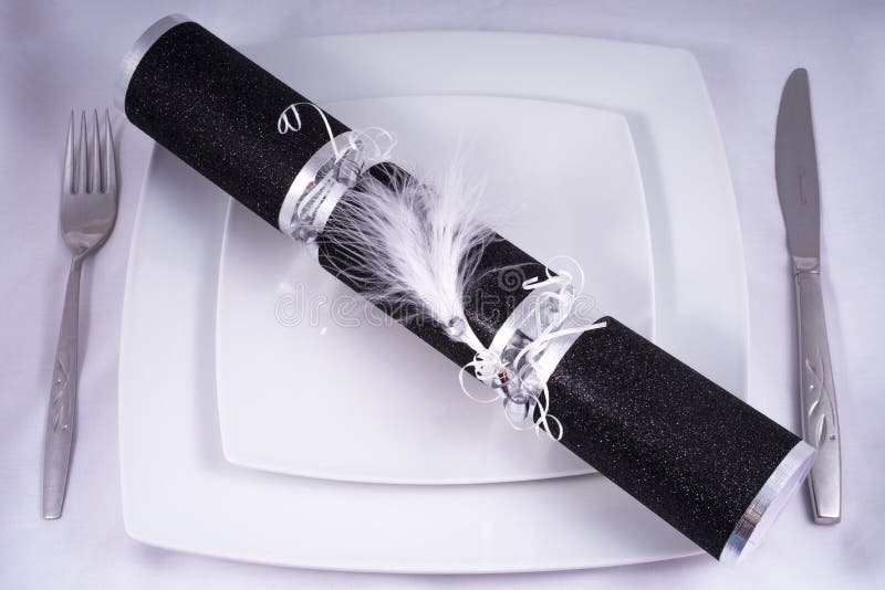 Wedding Table Place Setting with a Traditional Cracker royalty free stock photo