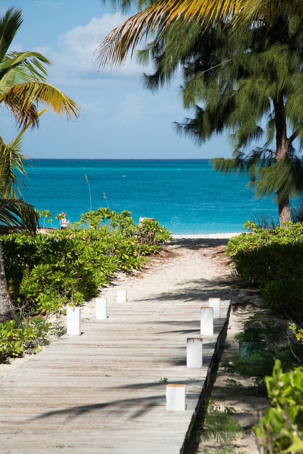 Pathway to the beach at the Turks and Caicos resort. Vertical. Pathway to the beach at the Turks and Caicos resort. Vertical