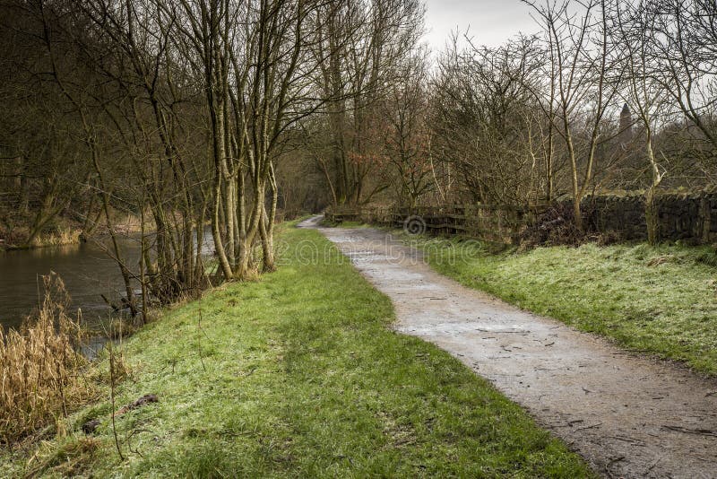 Weg die door het kanaal in Daisy Nook winden royalty-vrije stock afbeelding Weg die door het kanaal in Daisy Nook winden royalty-vrije stock afbeelding