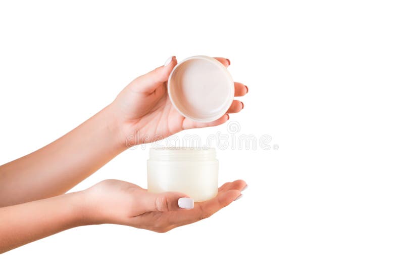 Weibliche Hand, die Sahneflasche Lotion lokalisiert hält Kosmetische Produkte des Mädchenöffnungs-Glases auf weißem Hintergrund lizenzfreies stockbild Weibliche Hand, die Sahneflasche Lotion lokalisiert hält Kosmetische Produkte des Mädchenöffnungs-Glases auf weißem Hintergrund lizenzfreies stockbild