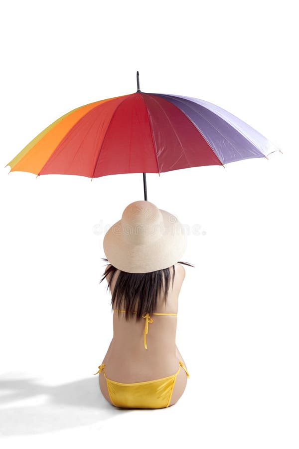 Weiblicher Tourist mit Badeanzug und Regenschirm lizenzfreies stockfoto Weiblicher Tourist mit Badeanzug und Regenschirm lizenzfreies stockfoto