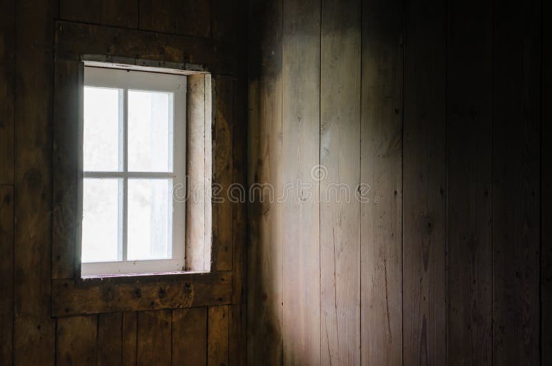 Soft Natural Light coming through Barn window to brighten Barn Board Interior. Soft Natural Light coming through Barn window to brighten Barn Board Interior.