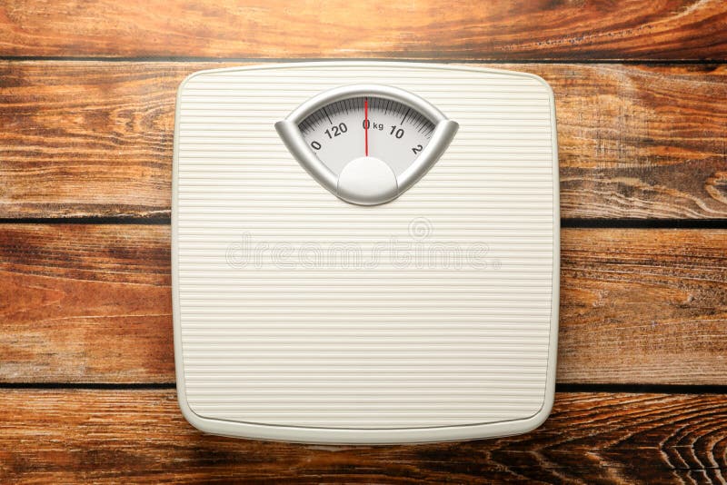 Weigh Scales on Wooden Table, Top View. Overweight Concept Stock Image ...