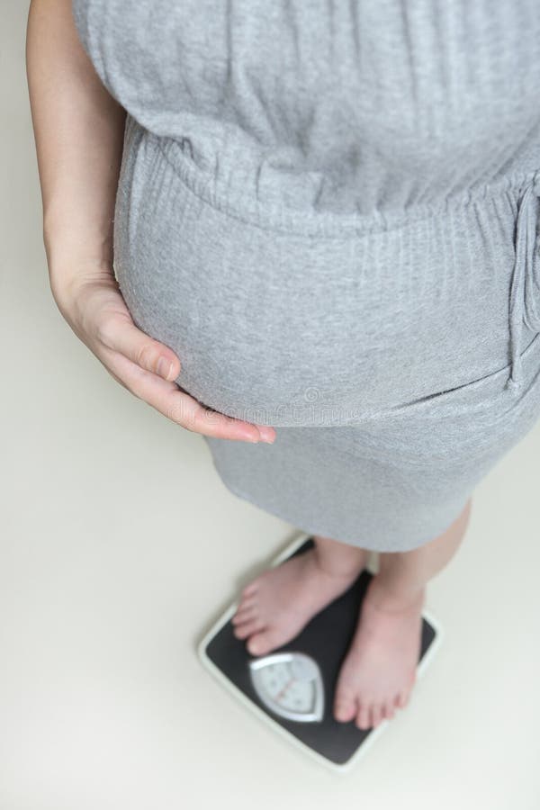 Pregnancy weight gain stock photo. Image of woman, belly 33320764