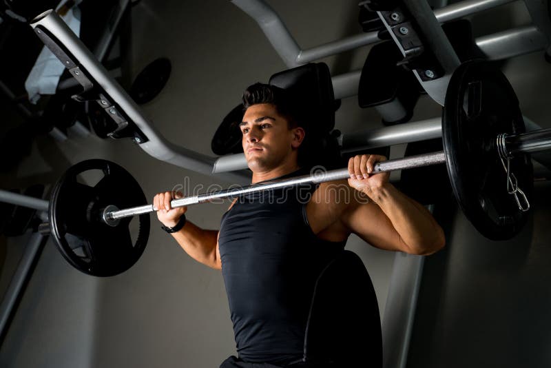 Weightlifter na Benchpress zdjęcia royalty free Weightlifter na Benchpress zdjęcia royalty free