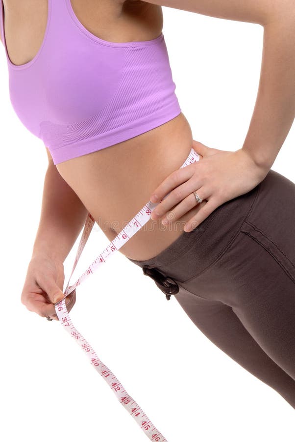 A Young Woman Measuring Her Weightloss