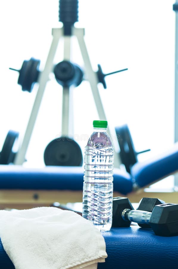 Weights Stand, Bench of a Gym, Towel Water Bottle Stock Photo Image