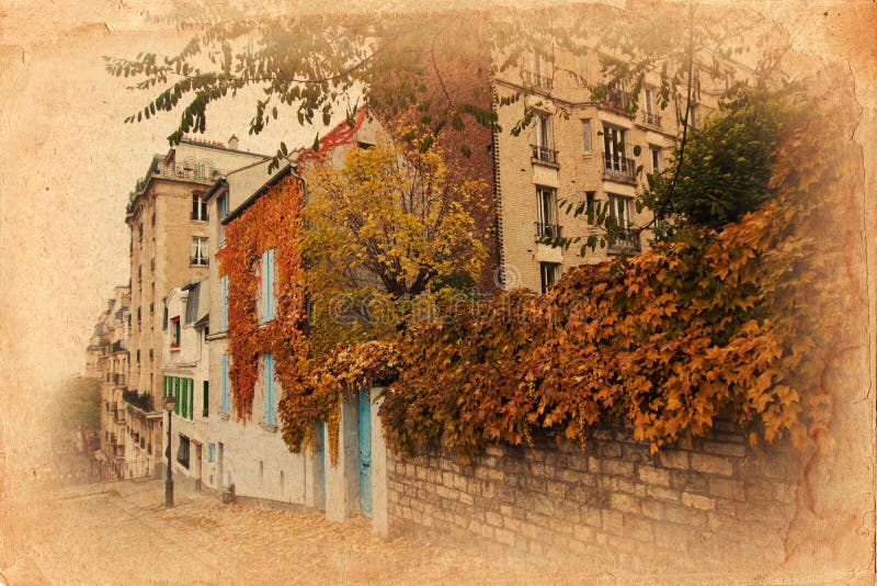 Vintage style picture of a road on the Montmartre hill, overlaid with an antique paper texture. Vintage style picture of a road on the Montmartre hill, overlaid with an antique paper texture