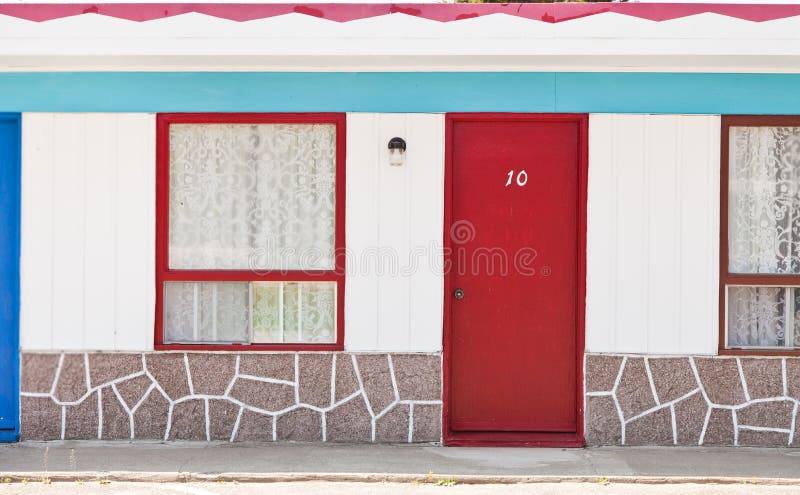 Motel with red and blue doors