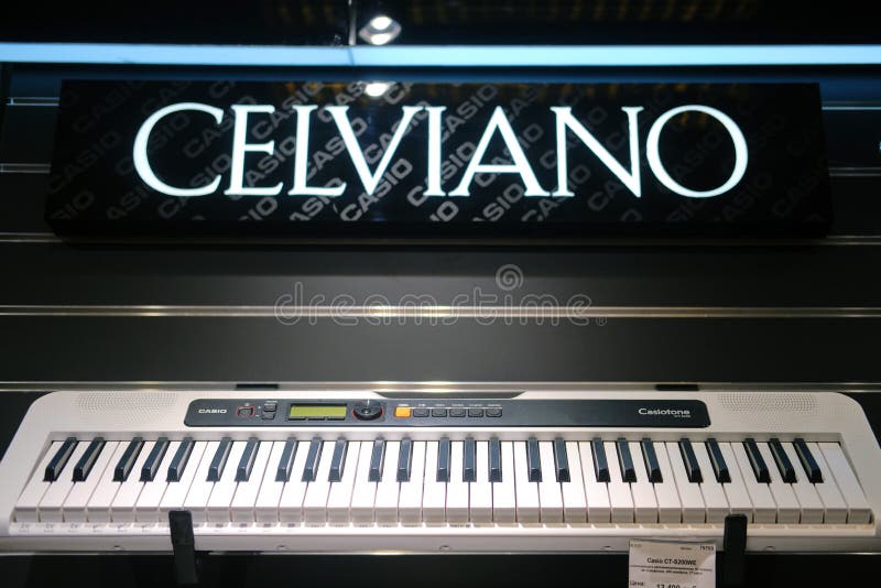 White synthesizers Casio  electronic piano Celviano in musical store. White synthesizers Casio  electronic piano Celviano in musical store.