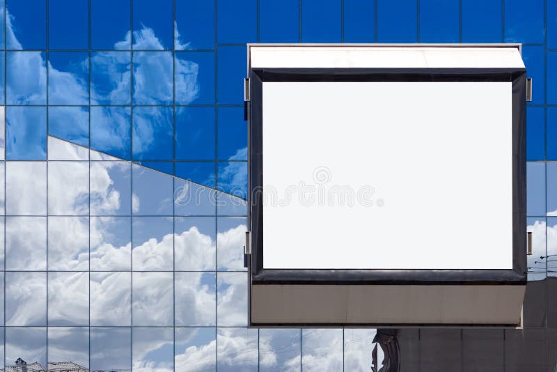 White bill board advertisement in glass brick wall in business building. White bill board advertisement in glass brick wall in business building