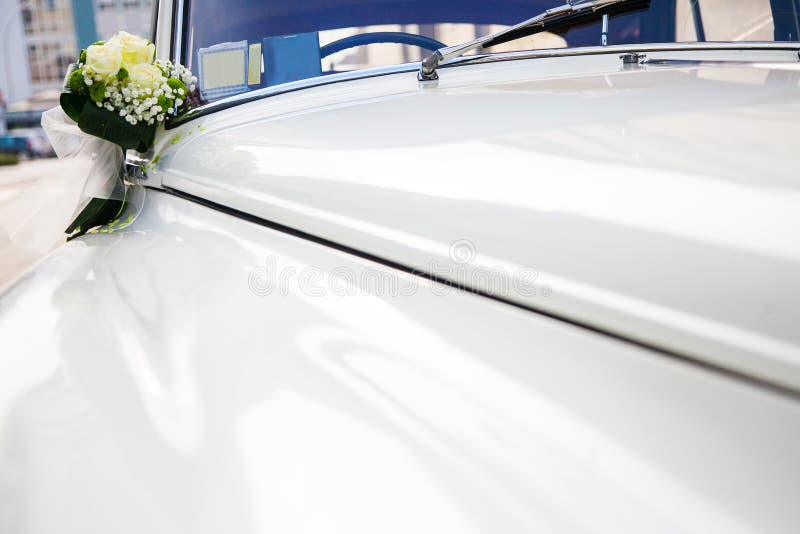 Luxury wedding white car decorated with flowers. Luxury wedding white car decorated with flowers