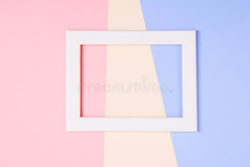 Weißer Holzrahmen über buntem Papierpastellhintergrund stockfotos Weißer Holzrahmen über buntem Papierpastellhintergrund stockfotos
