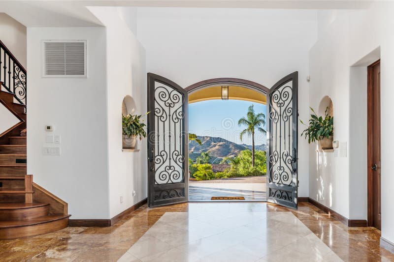 Luxurious mountain home entrance with marble floors. Luxurious mountain home entrance with marble floors