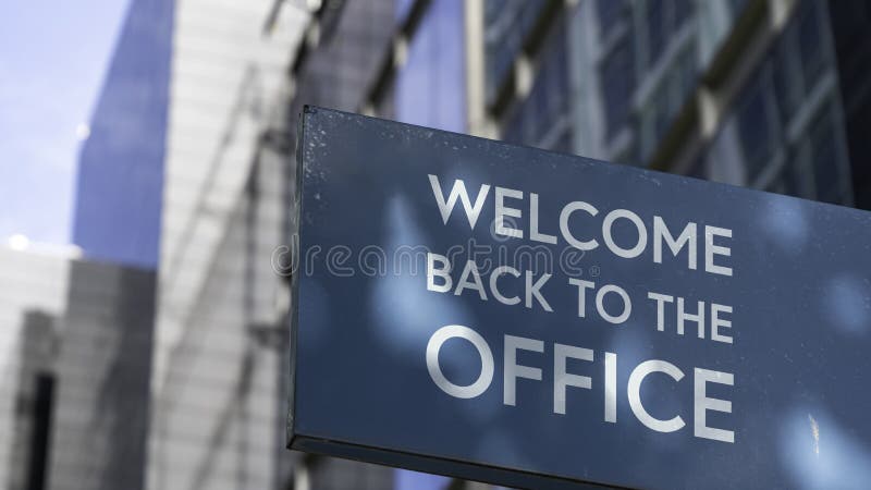 Welcome Back To the Office on a Blue City-center Sign in Front of a
