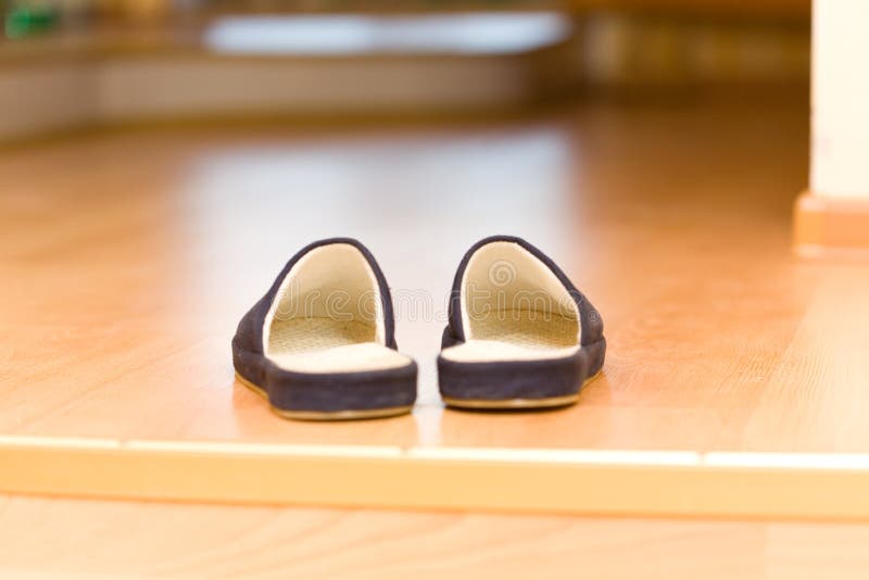 Welcome home! #1. Welcome home! Slippers under entrance to porch royalty free stock photography Welcome home! #1. Welcome home! Slippers under entrance to porch royalty free stock photography