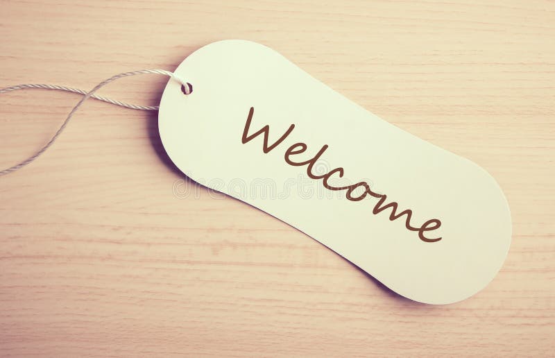 Bienvenidos! (Welcome! In Spanish) Sign With Arrow On Beach Background  Stock Photo, Picture and Royalty Free Image. Image 61777657.