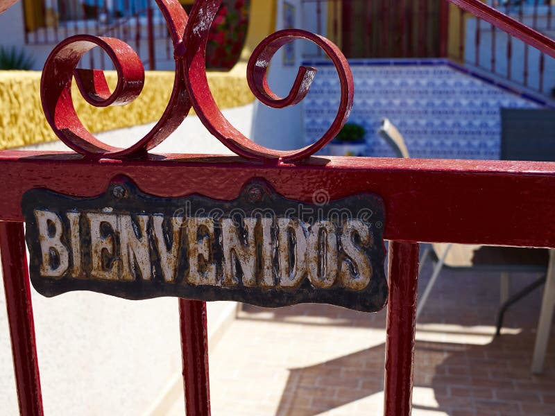 Bienvenidos! (Welcome! In Spanish) Sign With Arrow On Beach Background  Stock Photo, Picture and Royalty Free Image. Image 61777657.