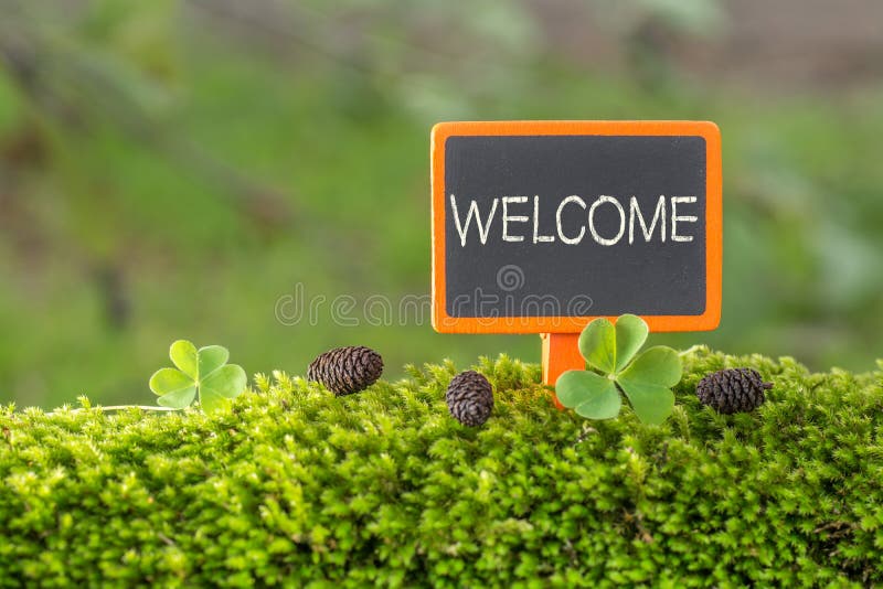 Welcome text on small blackboard stock photography