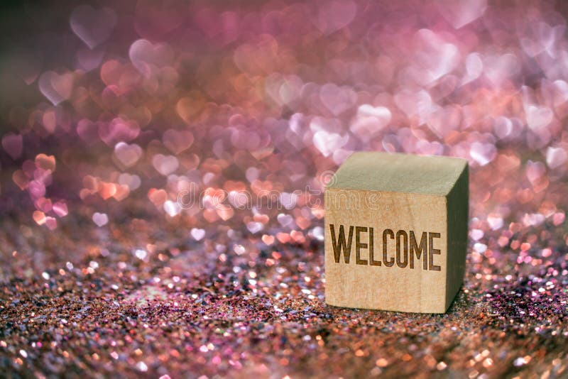 Welcome text with heart bokeh light royalty free stock photo