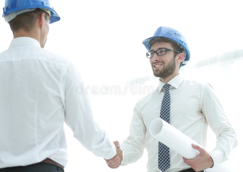 Handshake architect and civil engineer royalty free stock photos