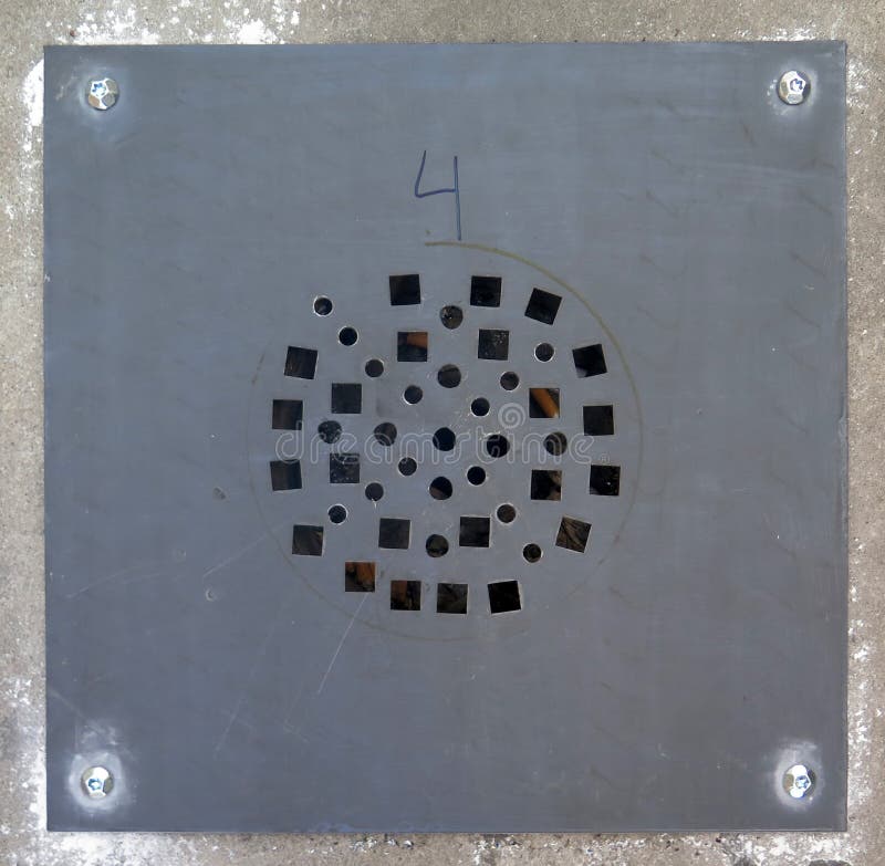 Welded down Drain Cover stock photo. Image of drainage 95189174