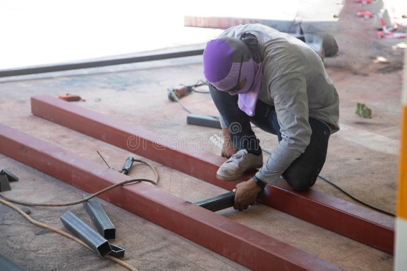 The Welder is Welding the Structure on the Floor Stock Photo Image of