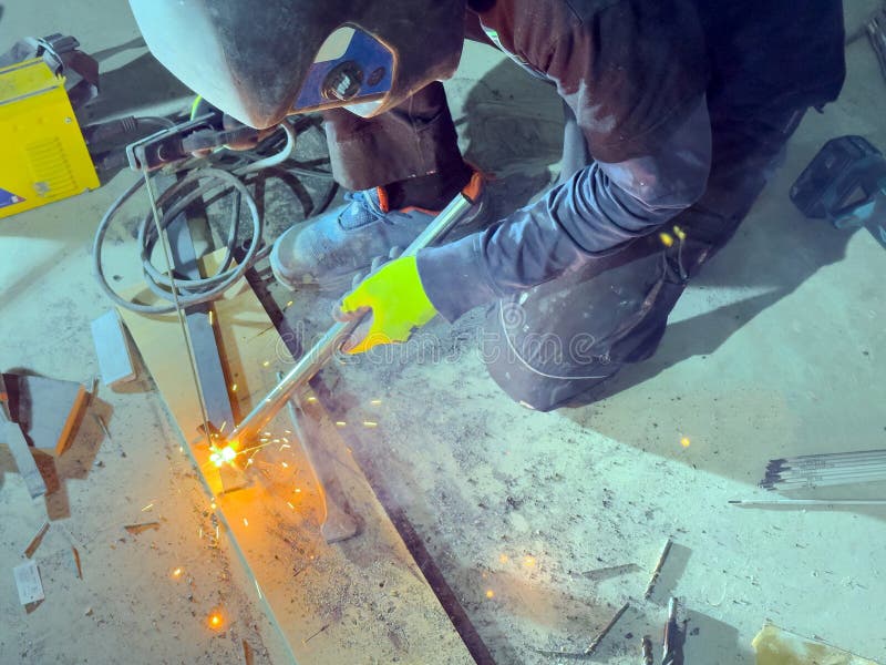 Welding with Argon or Electrode, Using a Welding Machine. Stock Photo