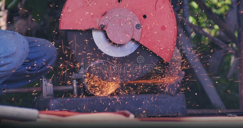 Welding machinery iron metal sparking equipment. Hot flame welding metal work cutting fire iron workshop. Locksmith using Welding royalty free stock images