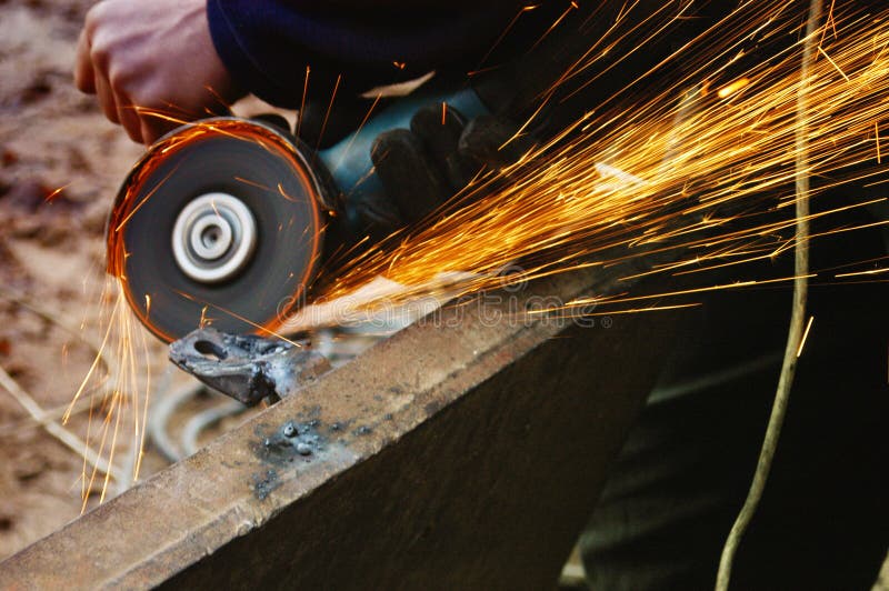 Welding metal, sparks spreading royalty free stock image Welding metal, sparks spreading royalty free stock image