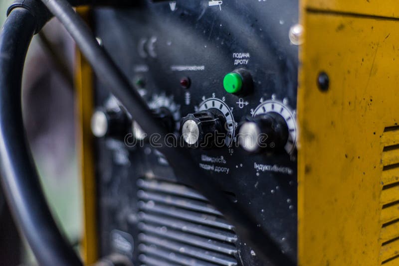 Welding MIG machine in yellow color, used in workshop. Closeup machine tool stock images, royalty-free photos and pictures