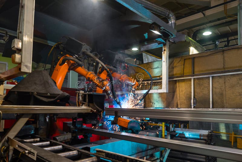 Welding Robot Welds Metal Parts. Stock Image Image of line, assembly