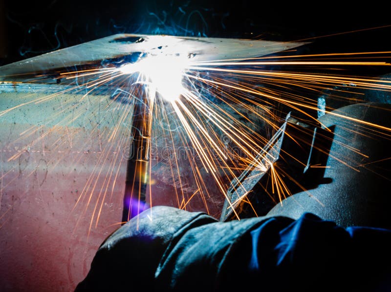 Welding with sparks stock image. Image of occupation 35834899