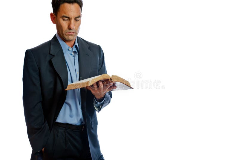 Well dressed man reading the Bible