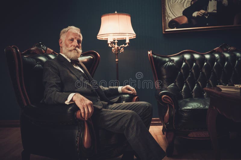 Well-dressed senior man in luxury interior