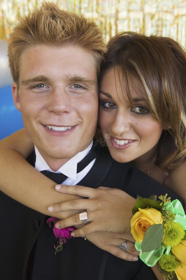 Well-dressed teenagers at school dance